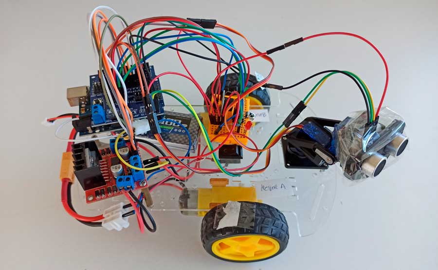 Robot arduino controlado por infrarrojo, con sensor de distancia